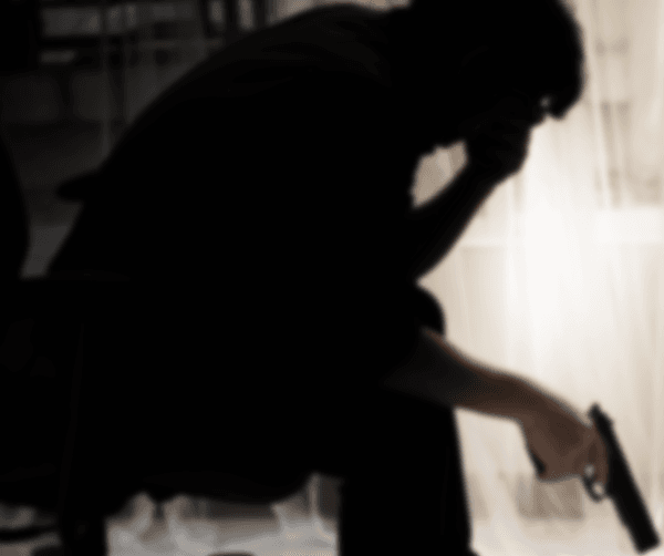 Depressed Man Holding Gun