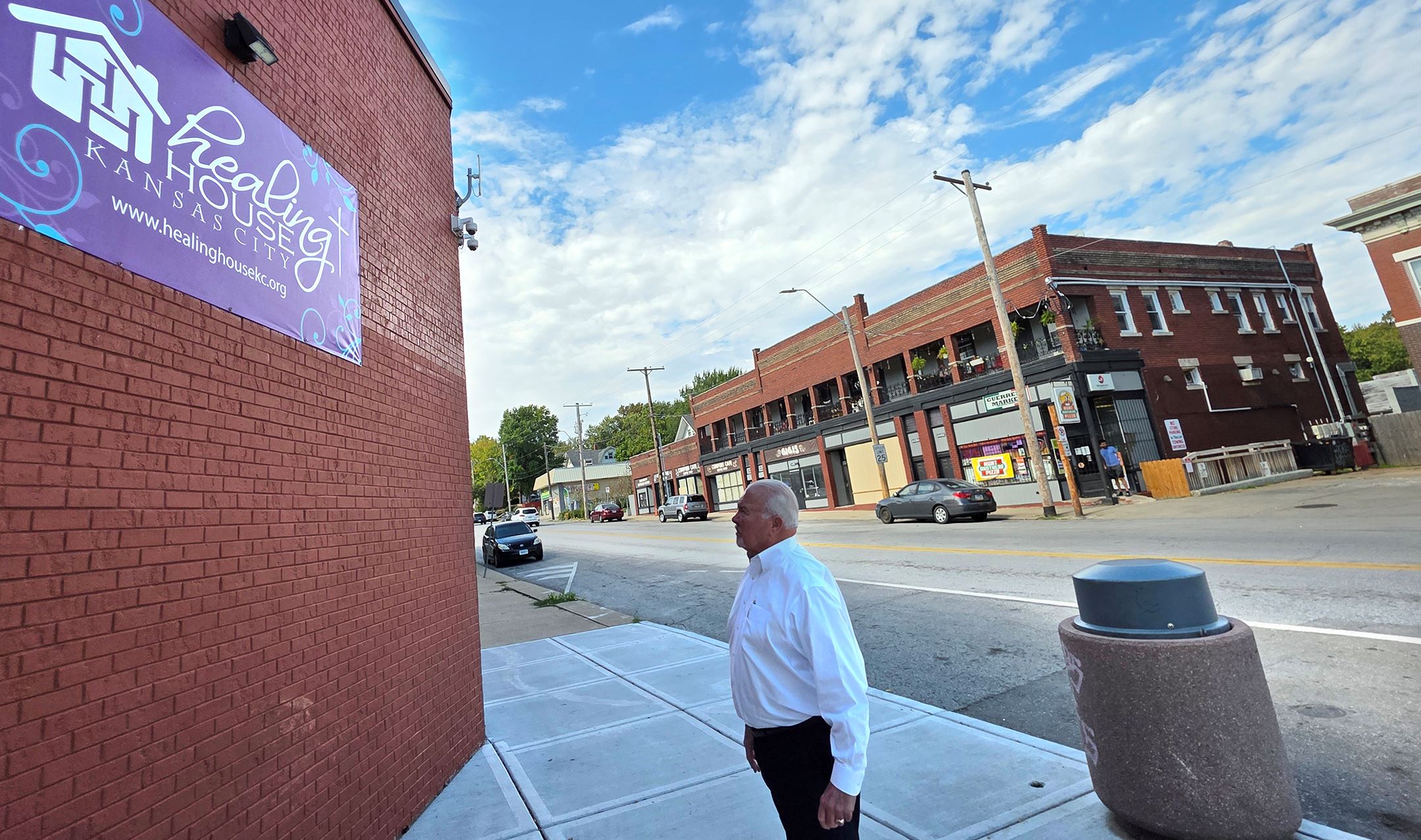 Healing House: Commissioner Larry Beaty Looks At Healy House Sign